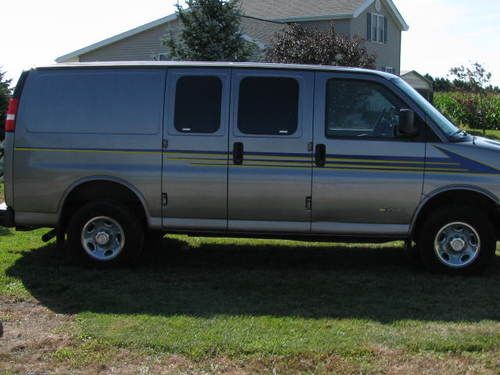 Chevy express cargo van g20 hd van has drivers, side door option and pass side