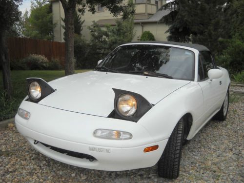 Excellent condition, new engine with less than 5000 miles, soft top convertible