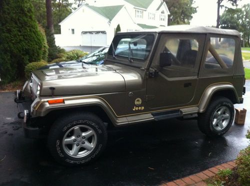 1989 jeep wrangler sahara 4.2l automatic, soft top w/ 1/2 drs, only 11,100 miles