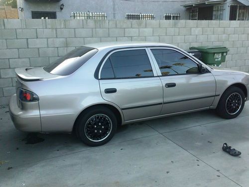 Toyota corolla 2000 with 180k miles, runs smooth!!