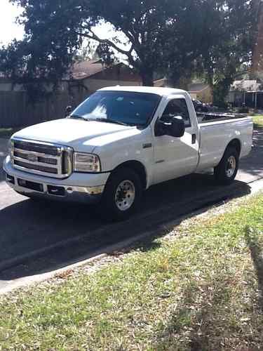 2004 white ford f350 with 1995 trailor