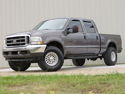 04 f250 lariat power-stroke (lifted) fabtech new-bfgs swb carafx never abused tx