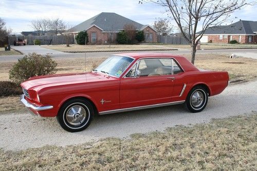 1964 1/2 mustang coupe with a/c and full center console.