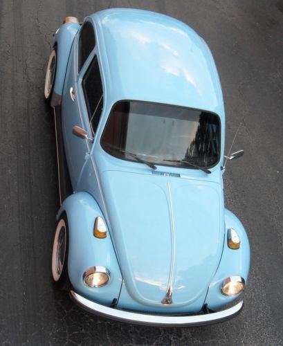 Vw super  beetle, 1600cc engine, 4 speed, chrome wheels, white wall tires