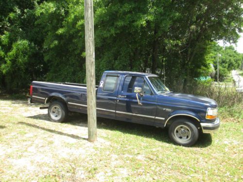 Great truck, kinda rough body but solid, blue, king cab ,  foot bed