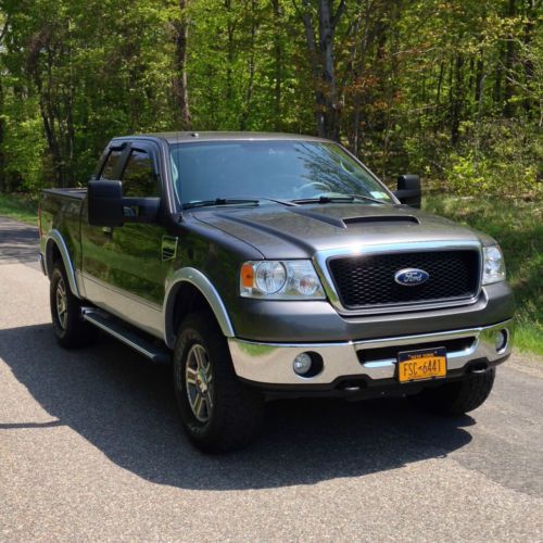 2007 ford f150 ext cab. oversize tires, roush exh, intake, flares, lift, leather