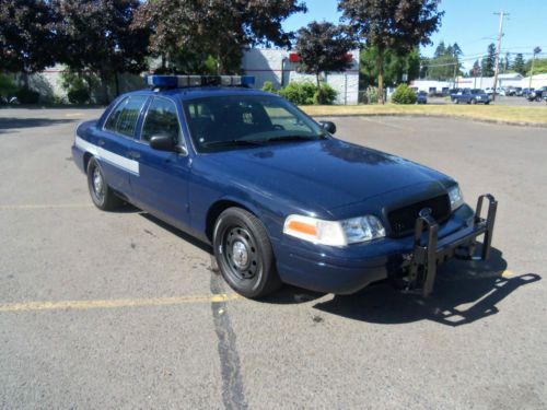 Crown victoria police car most complete police car around 98k lights,seat,bars