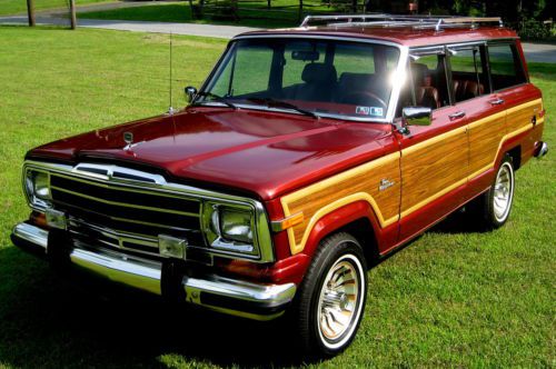 1986 grand wagoneer,beautiful red met./red leather,35korigmiles,v-8,ps,pw,ac,exc