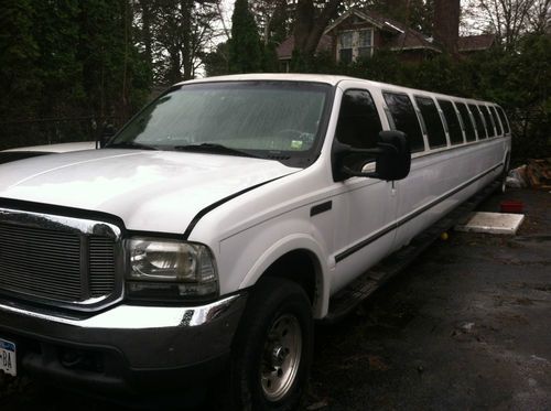 2000 white ford excursion - seats 26 - 240  inches in length rear vip area