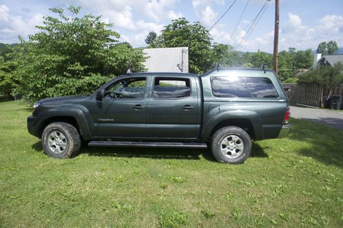 2011 toyota tacoma v6, 4dr, 4wd, 29,500miles, lots of extras!