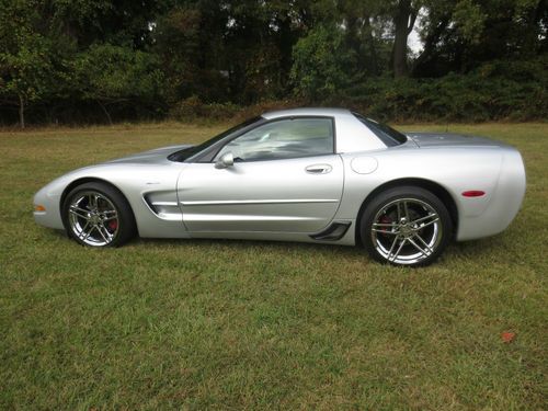 Heads up display,upgraded chrome wheels,borla exhaust,z06 mats,low miles