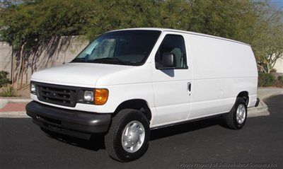 2007 ford e-150 cargo van with wall covers and rubber flooring