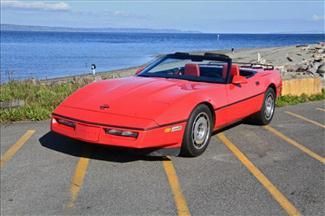 1987 red corvette with red interior and black top very nice great driver