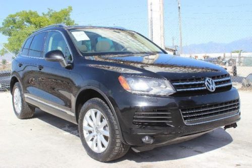 2011 volkswagen touareg tdi damaged fixer runs! turbo-charged! priced to sell!