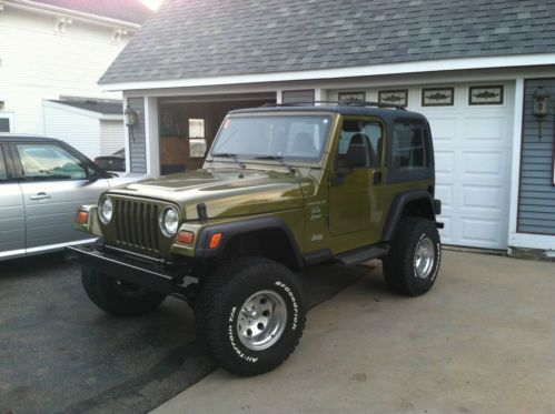 1997 jeep wrangler sport 4.0l with manual transmission; 4&#034; lift
