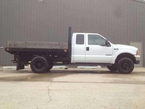 2000 ford f350 7.3l powerstroke 4x4 dually flatbed supercab low miles! look!