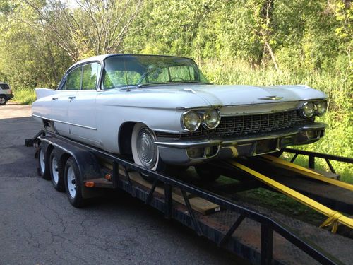 Two 1960 cadillac devilles- running, driving project- both have good chrome