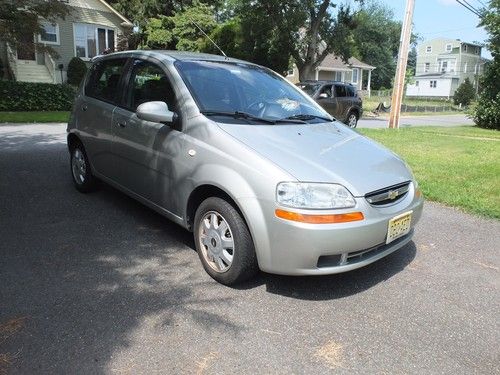 2005 chevrolet aveo lt silver hatchback, 78k miles, new engine, great on gas!