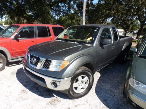 Nissan frontier. $ doors, ext. cab. engine noise......read all..one owner truck