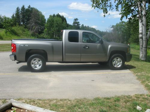 2009 chevrolet silverado lt extended cab 4x4 5.3l  48k miles with 4 extra tires