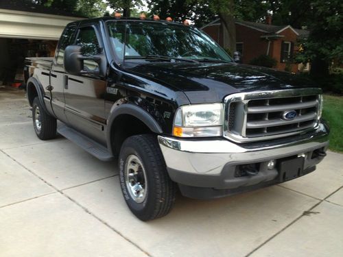 2002 ford f250 4x4 super cab with camper package - great condition