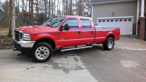 2004 ford f350 super duty diesel 4x4, fx4 lariat, red crew cab long 8' bed, gps