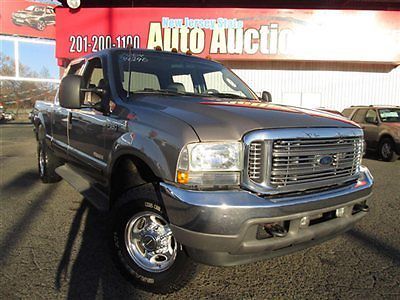 04 f-350 lariat crew cab 4 door 4x4 6 1/2 ft bed carfax certified pre owned
