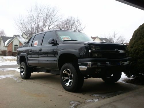 2003 chevy avalanche z71, lifted, loaded options