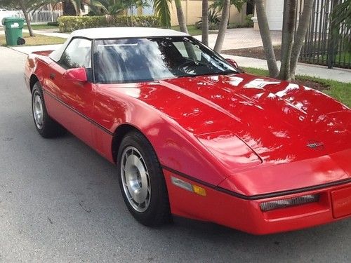 1987 corvette convertible red exterior red interior with a white convertible top