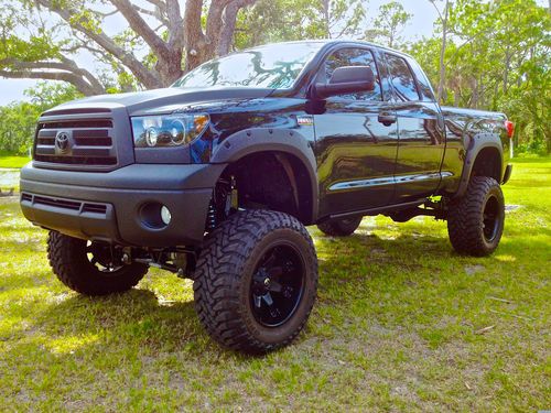 2011 toyota tundra rock warrior 4x4 with fox suspension and 12" bulletproof lift