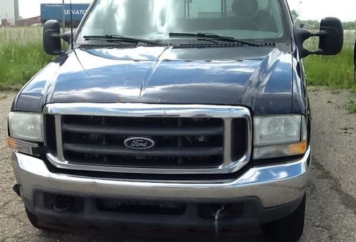 2002 ford f350 7.3l turbo diesel crew cab with hard shell bed cap - 425k miles