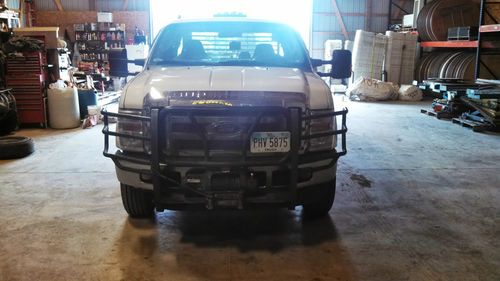 2006 white ford f250 xlt super duty extended cab,v10,curt hitch,warn wench