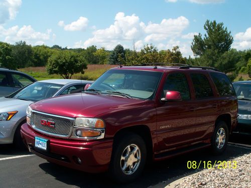 Red 2003 gmc youkon denali loaded  must see