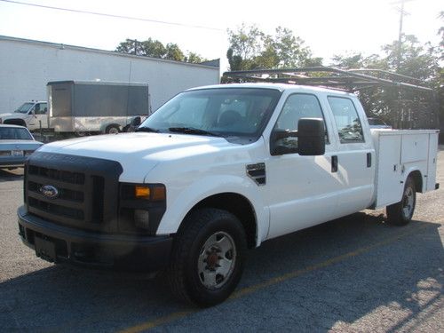 Super low miles 38k upgraded with f350 suspension 10200 gvw clean utility box $$