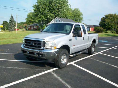 F250 super duty 4x4 exstended cab silver in color ps pb pw pdl tilt cruise cd