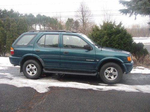 Honda suv passport 4 wheel drive good mpg perfect in &amp; out moonroof c/d cold a/c