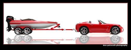 2009 saturn sky redline with custom matching 13' boat and trailer..