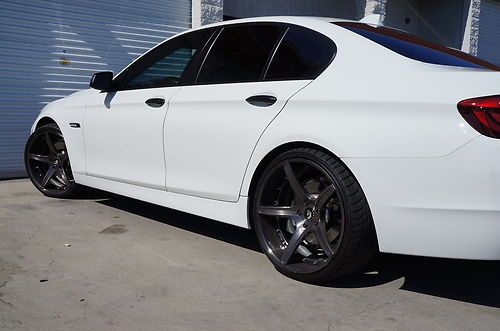 White excellent condition 4door 535i with 21" forgiato rims, and sounds
