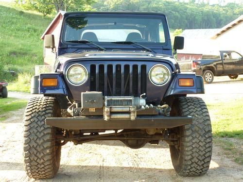 1998 jeep wrangler sport -  4.0 litre engine, automatic, 4x4 with 2" lift
