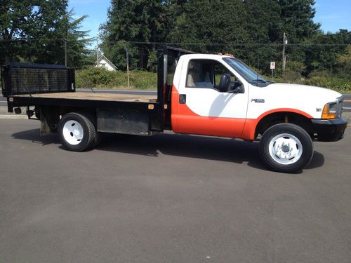 1999 ford f450 7.3 turbo diesel flatbed with hydraulic lift gate