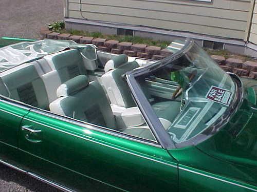 Trophy winner candy apple green olds 98 conv.  with pinstripping and silver leaf