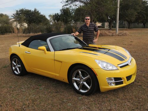 2008 saturn sky  roadster convertible 2-door 2.4l yellow w/black stripes