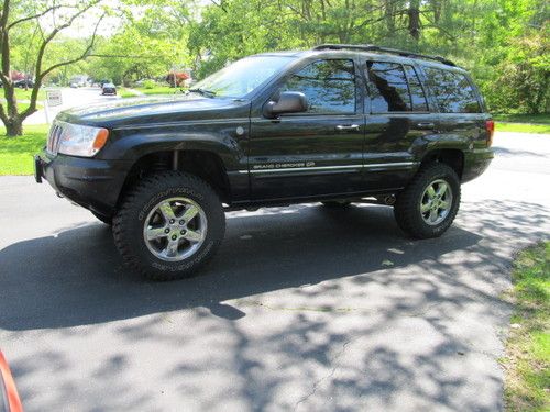 2004 jeep grand cherokee overland 4" lift 32" tires