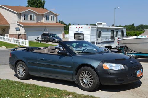Chrysler sebring touring convertible, low mileage! 58,543. clean title