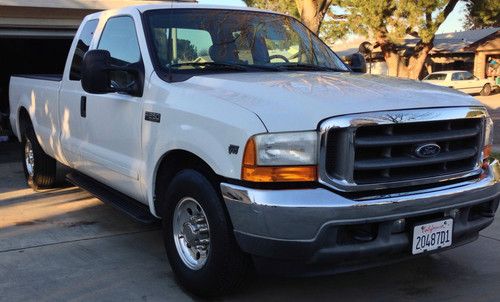 2001 ford f250,xlt,loaded,extended cab,low low miles,exceptional condition