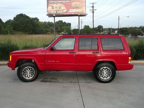 1997 red jeep cherokee country new parts low miles tow package