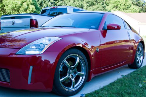 Very low miles, excellent condition, redline red, 2005 350z touring
