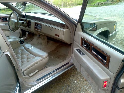 1991 cadillac fleetwood sedan 4door 4.9l tan with tan leather interior woodgrain