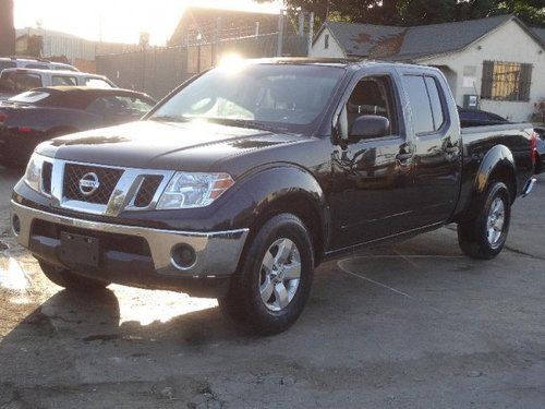 2009 nissan frontier damadge non repairable title only 64k miles runs!!!!!