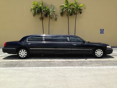 6 passenger 110" stretch "six pack" executive coachbuilders limo -black on black
